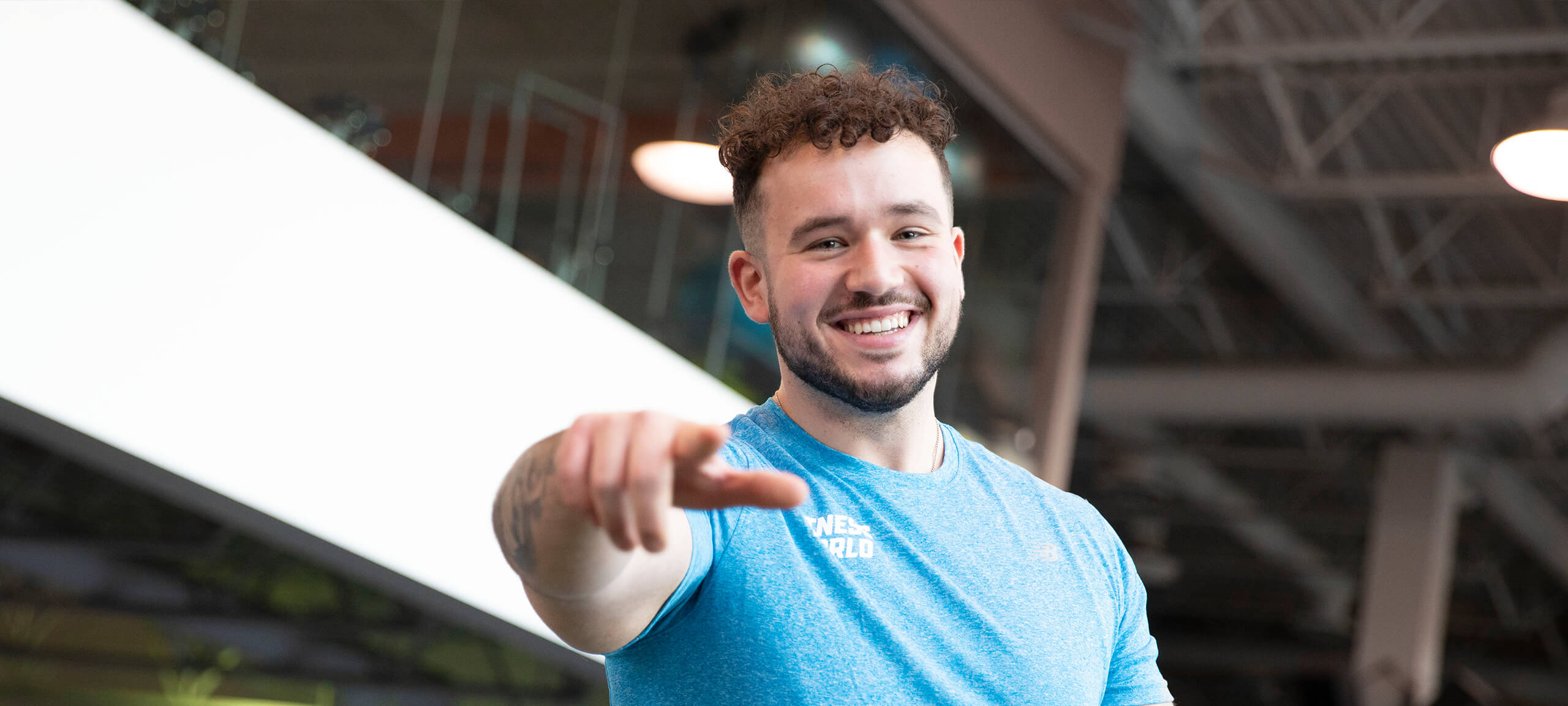 Profile image of man pointing at the camera