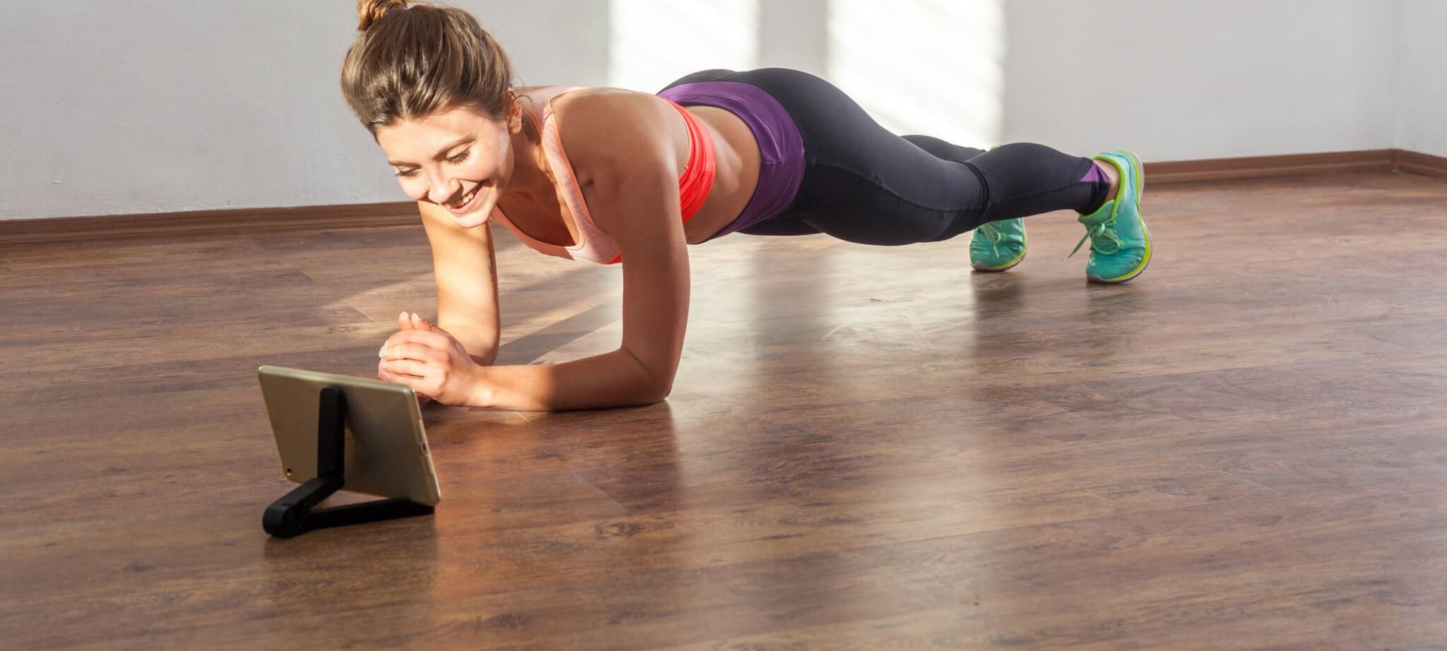 girl doing a plank workout