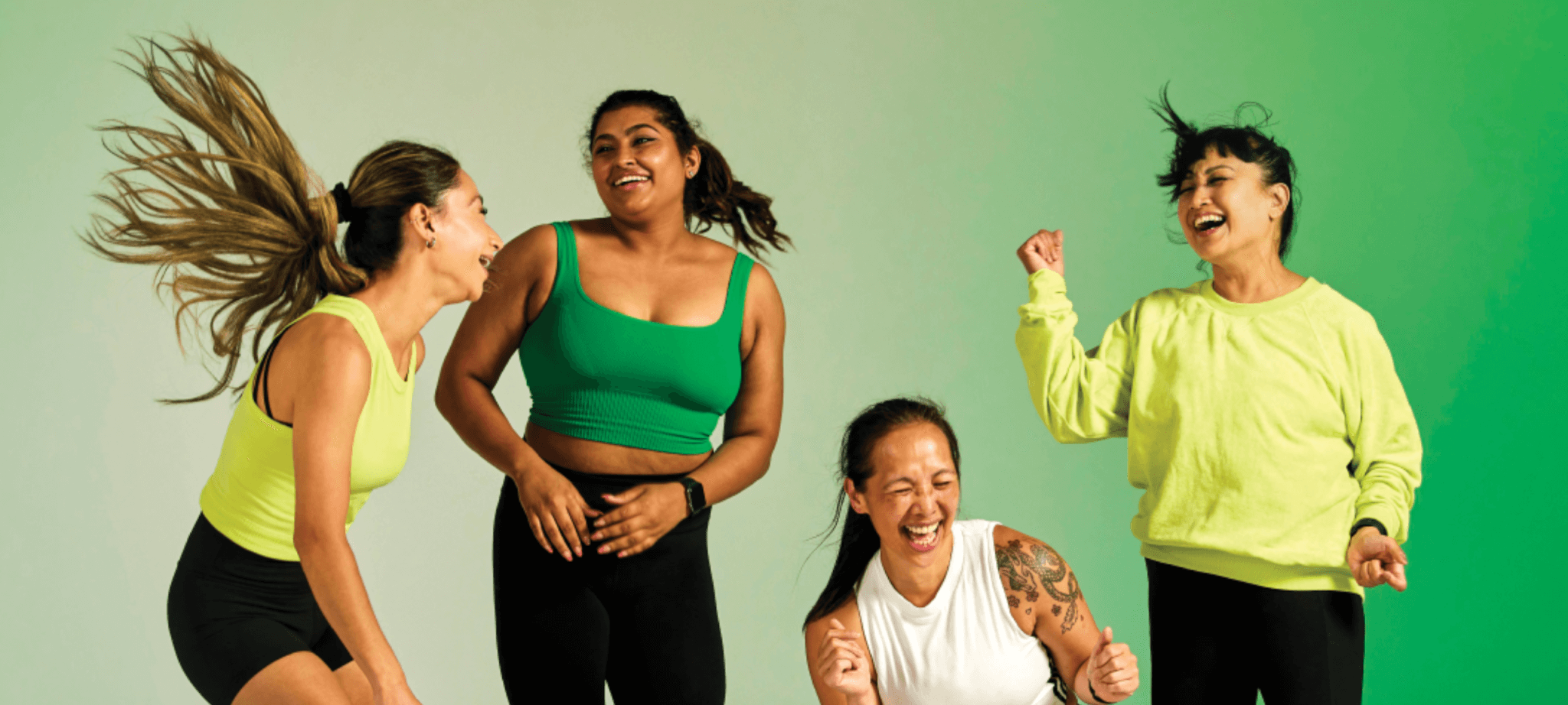 Group of 4 women laughing