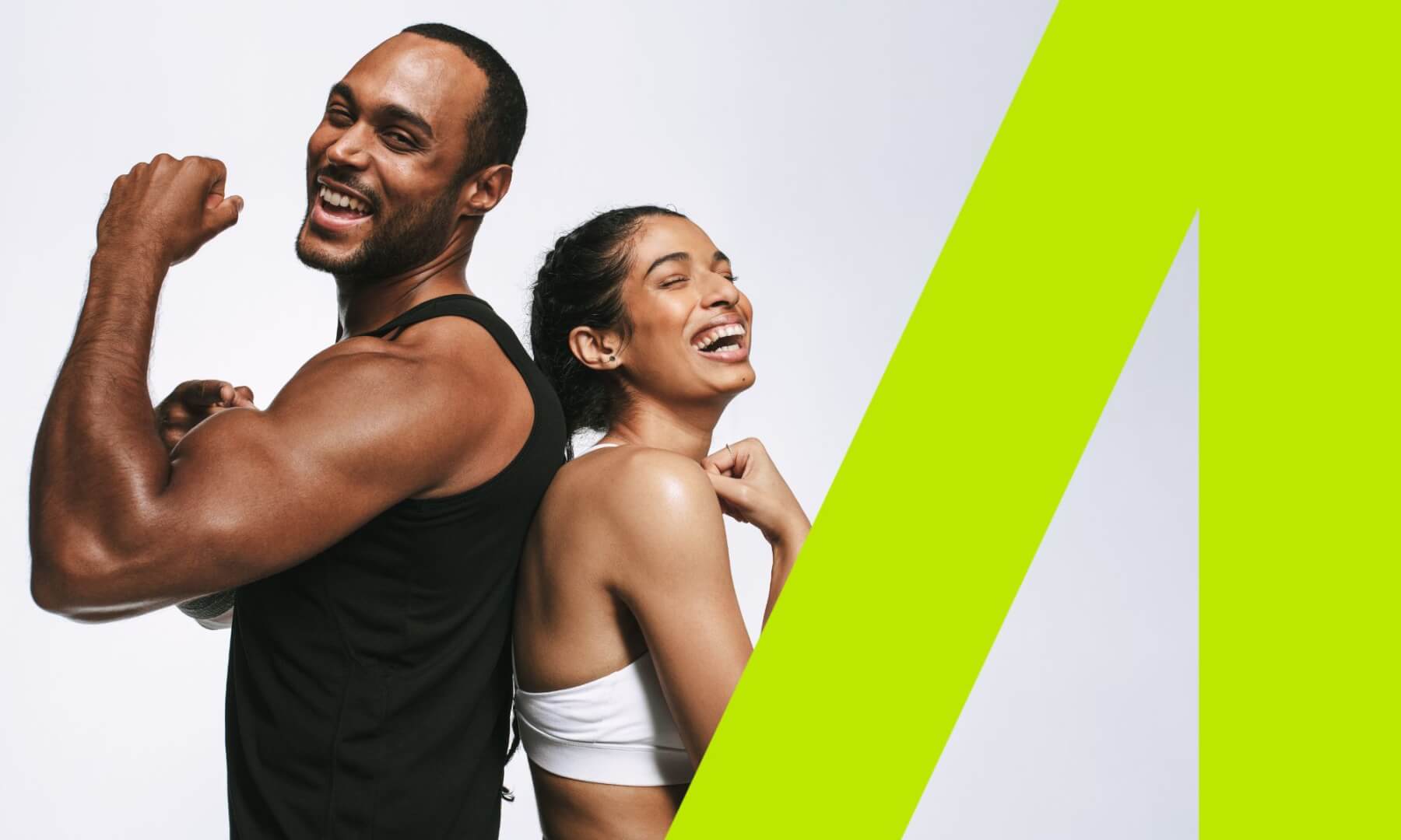 Man and women smiling next to each other