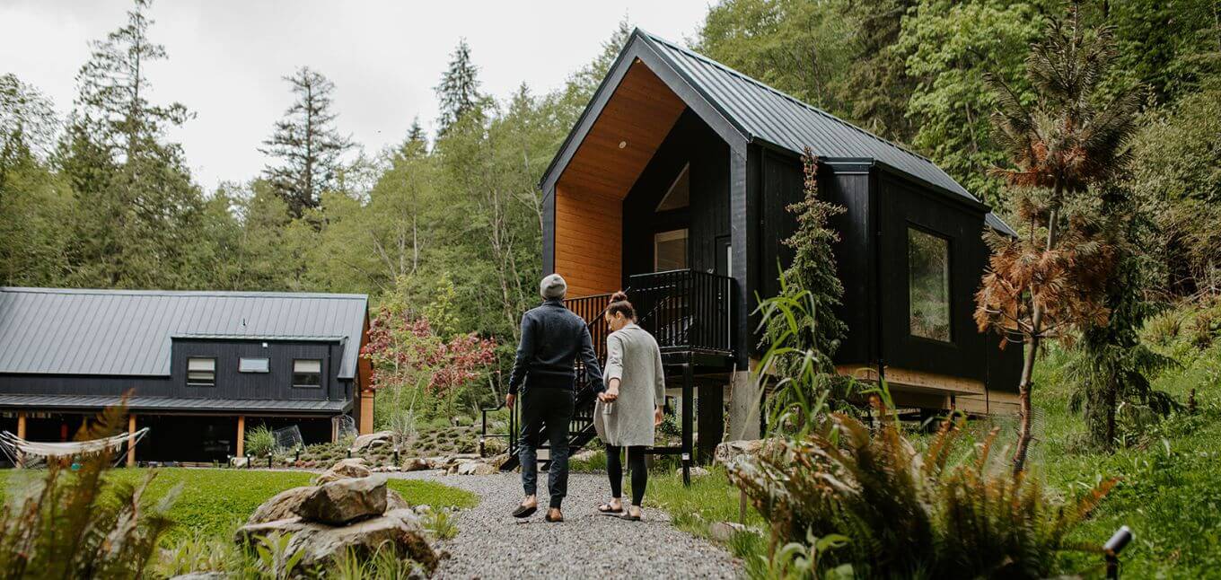 couple walking through wellness retreat